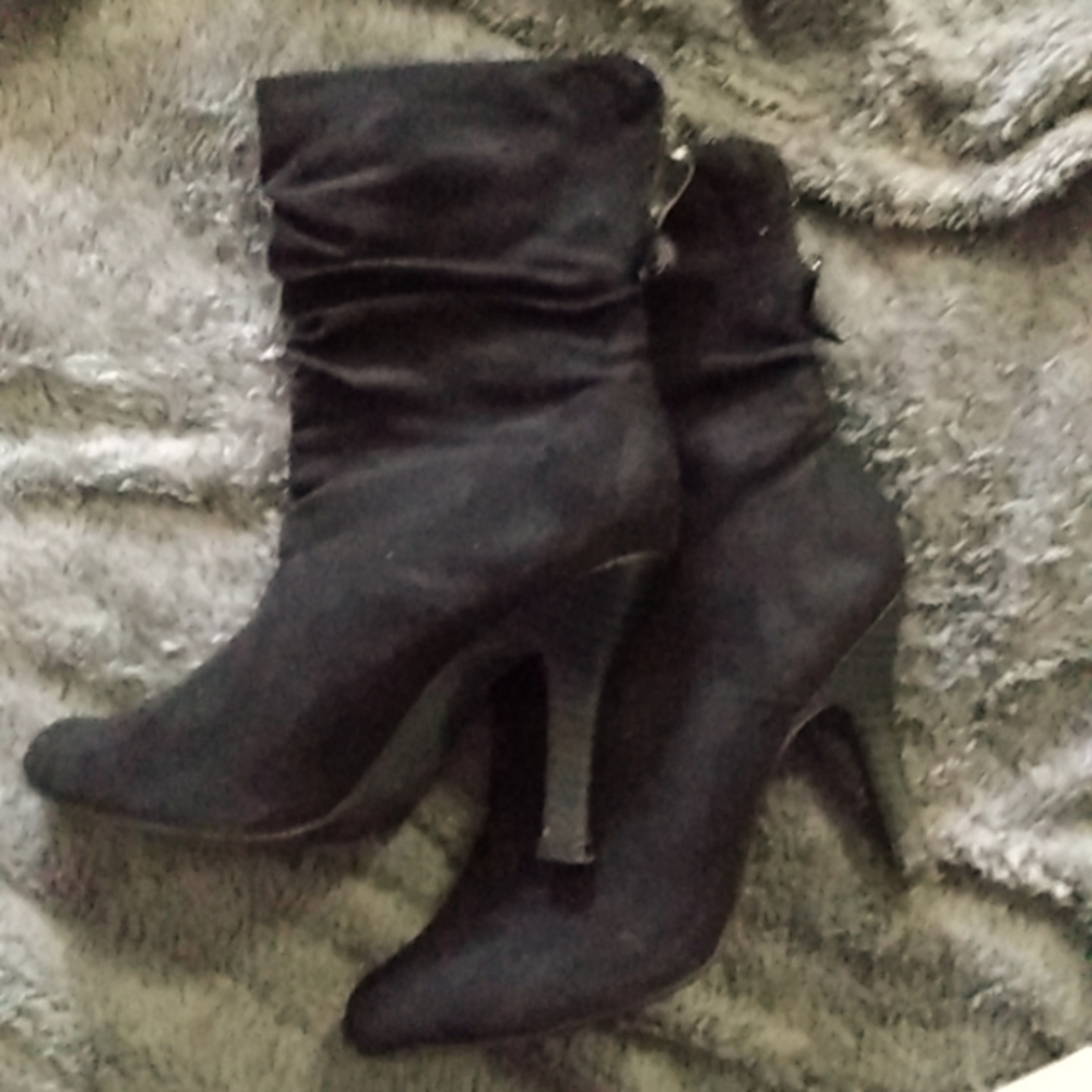 Black booties with patent leather trim and bow